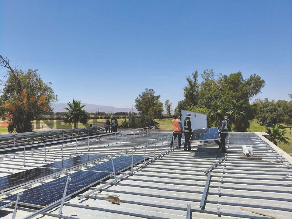 Adjustable tilt roof system